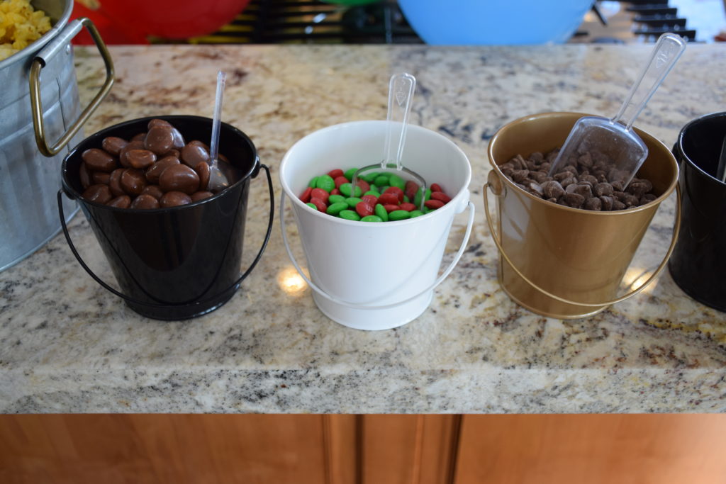 Different candies to mix in popcorn with scoops