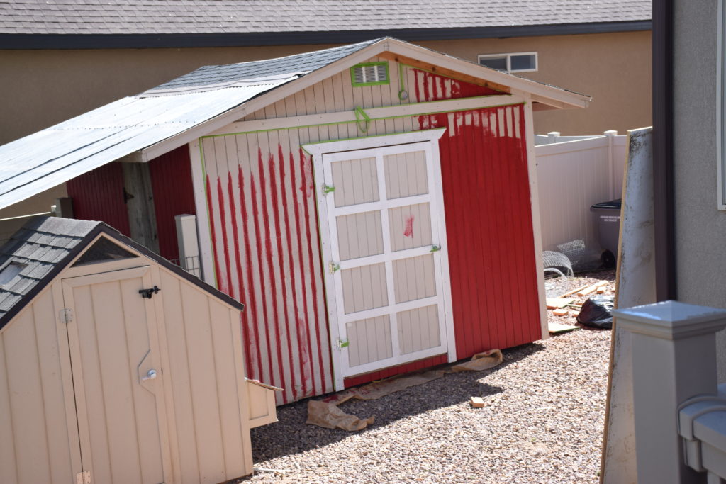 Picture of shed being painted red