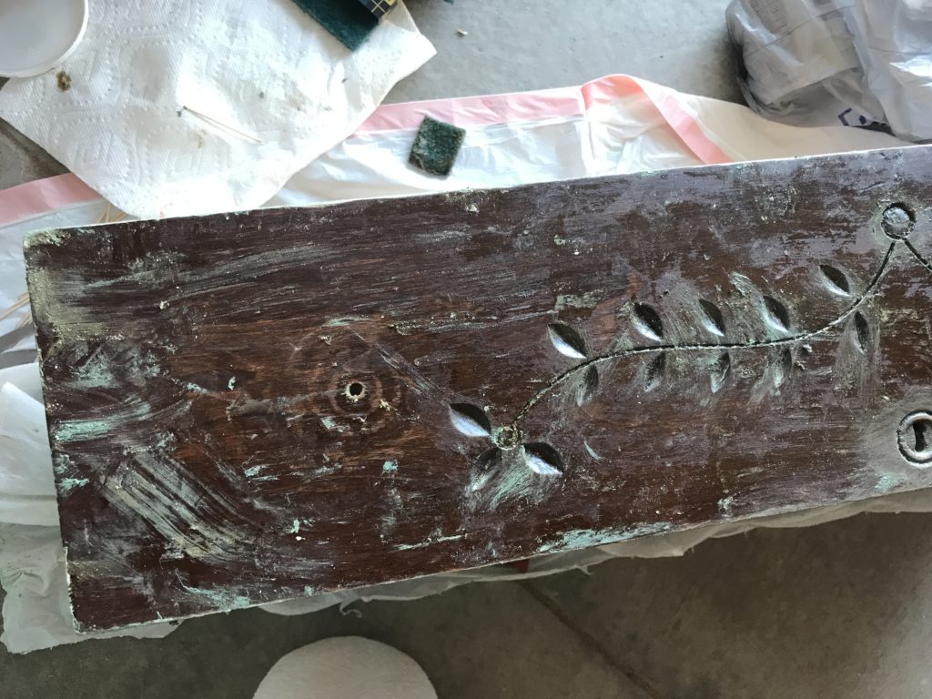 Leaf detail on dresser drawer front