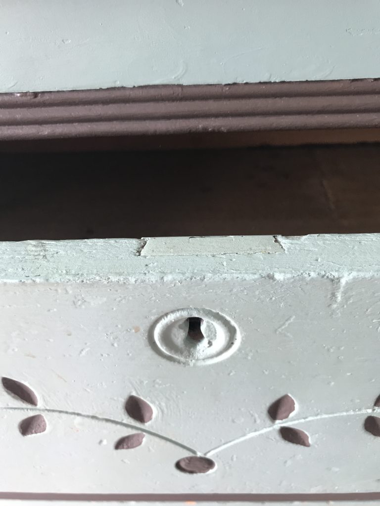 Close up of the top of the drawer lock