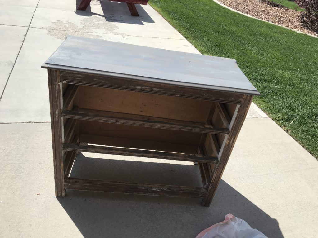 Different angles of dresser top stained in grey