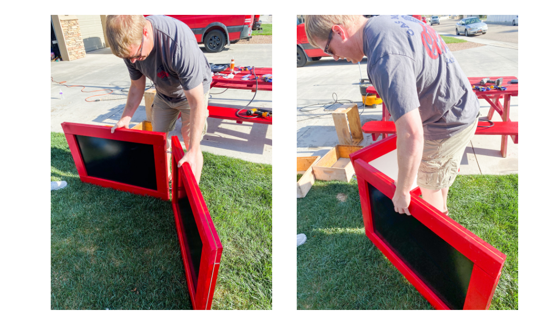 Man demonstrating how the display board can be changed.