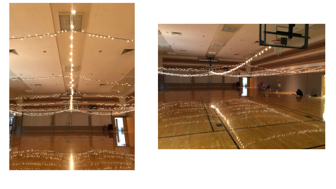 Lights strung over a gym ready for a party