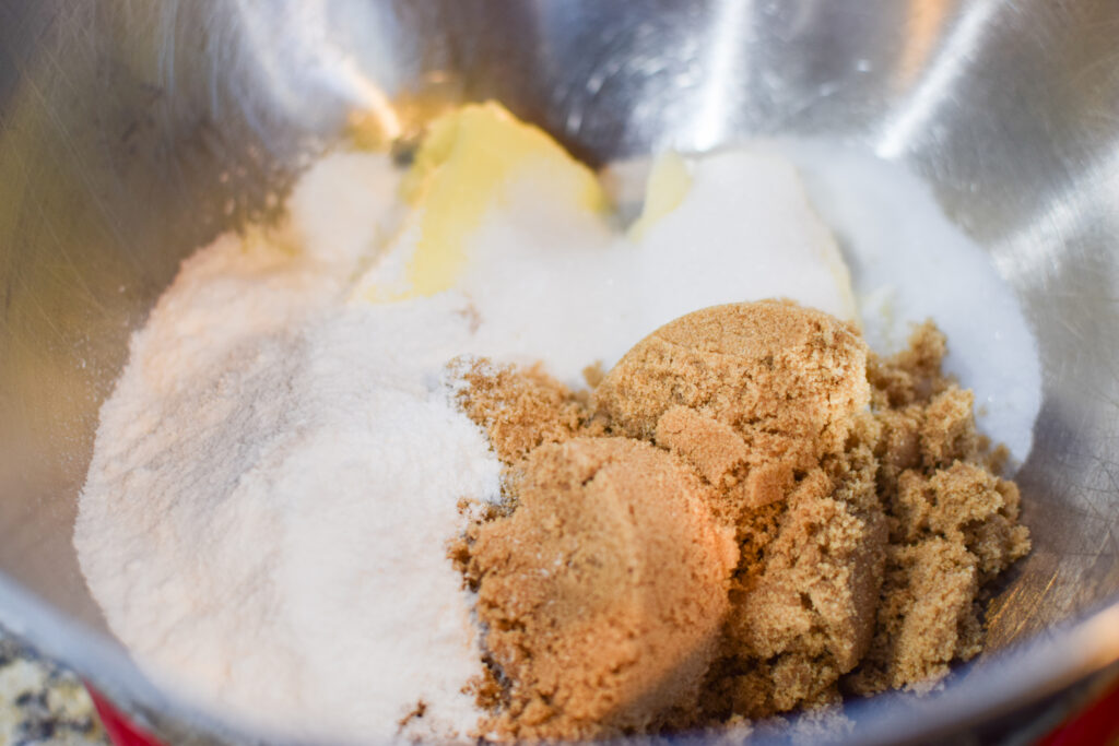 Brown sugar, sugar, pudding mix and butter in a bowl